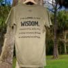 Back of Livin' Light's "Wisdom Comes from Above" olive green, short-sleeved T-shirt with tree background. Owl with wings spread and piercing eyes which illustrates Bible verse Proverbs 2:6.