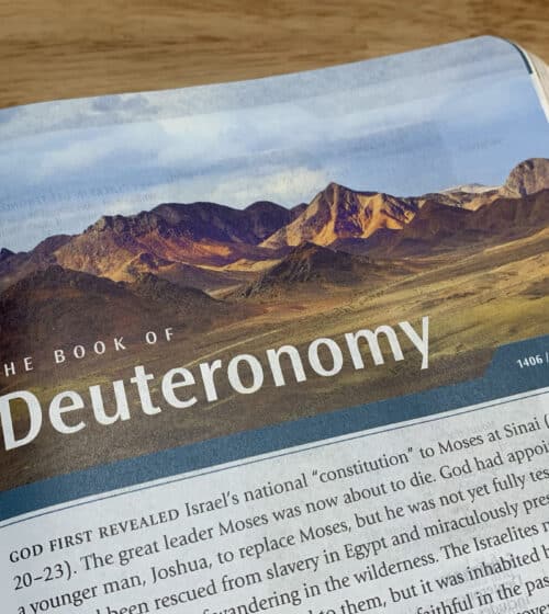 Deuteronomy Moses Bible open to book of Deuteronomy
